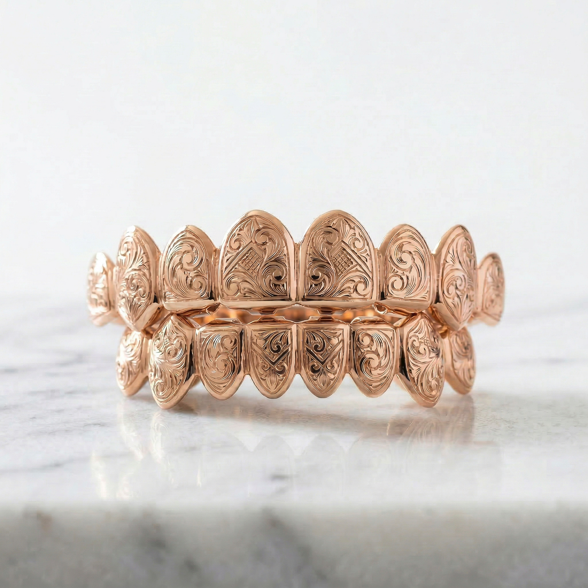 Engraved Grillz Featuring a Gold Bar in the Back